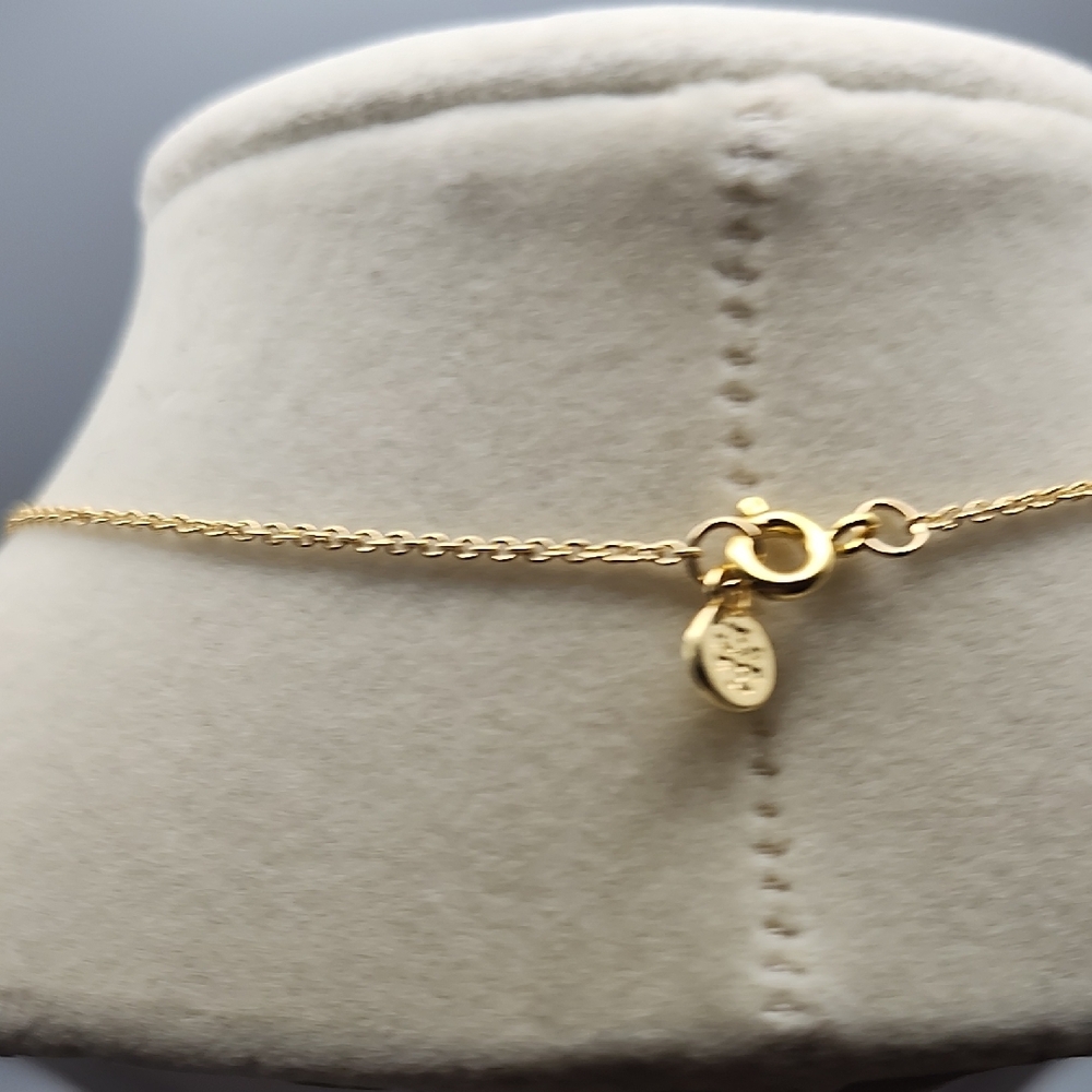 Tory Burch Black and Gold Emblem Necklace - Picture 7 of 9